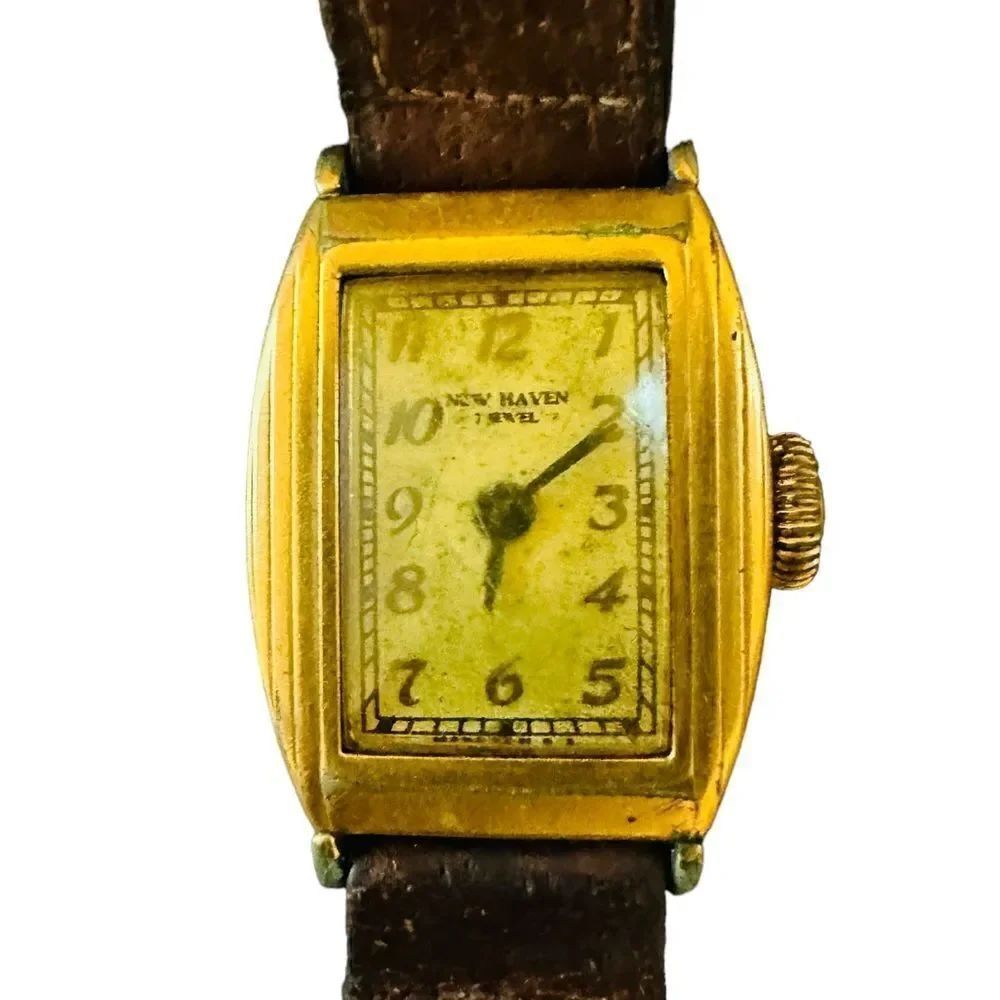 Vintage New Haven Jeweled Gold tone stainless Men’s Tank watch